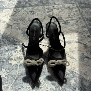 Thompson Black Pointed Toe Slingback Heels with Crystal Bow Accent